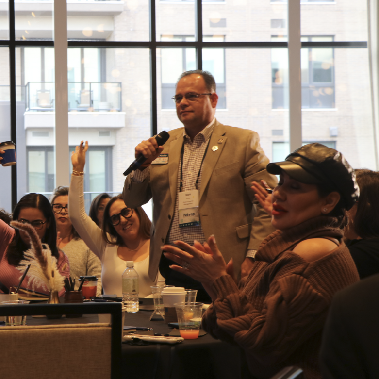 Mark Pinilla asks Garry Acosta a question at a NAHREP Leadership event in Denver, Colorado. 